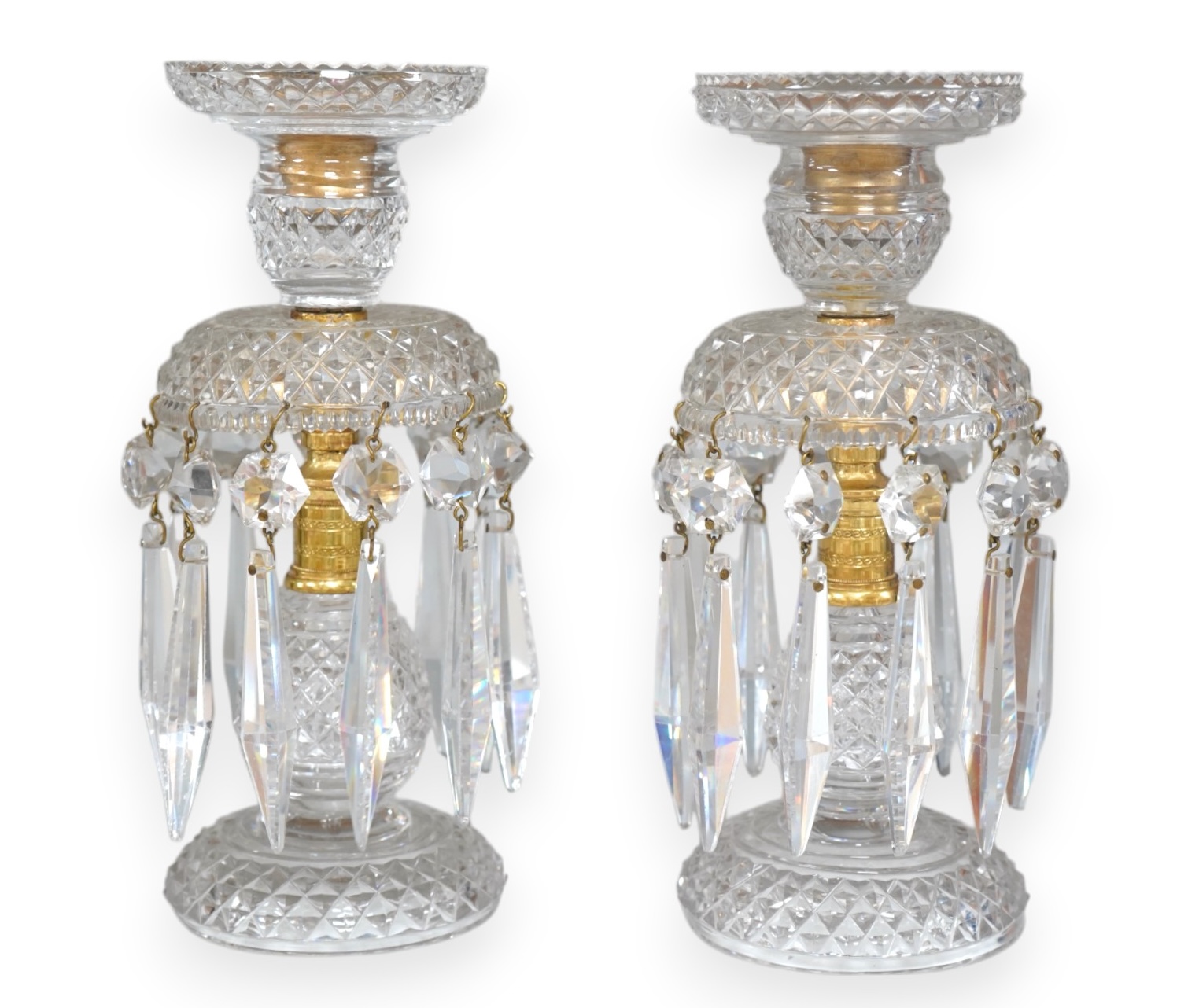 A pair of Victorian cut glass and gilt metal table lustres, 21.5cm. Condition- minor nicks